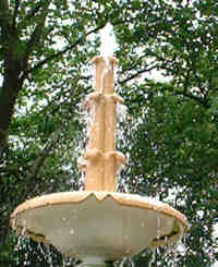 Note the attachment at the top of the fountain and how it forces the water into a spray.